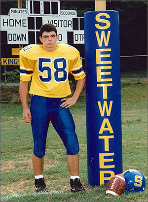 Joey Hunt in football uniform standing beside Sweetwater, TN goal post Joey Hunt in football uniform standing beside Sweetwater, TN goal post